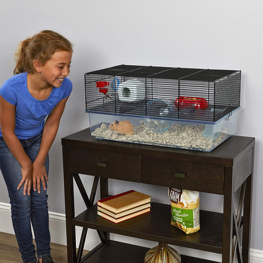 Hamster cage includes water bottle, exercise wheel food tray and